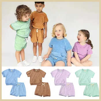 Корейската версия на детски дрехи, фланелка 2023 г., летните обикновена ежедневни панталони с къси ръкави за момчета и момичета, комплект от две части